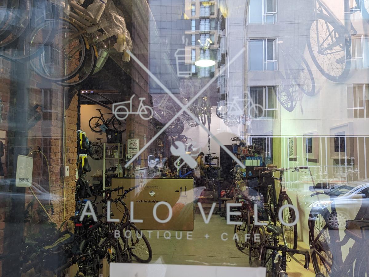 Front window of Allo Velo bike shop